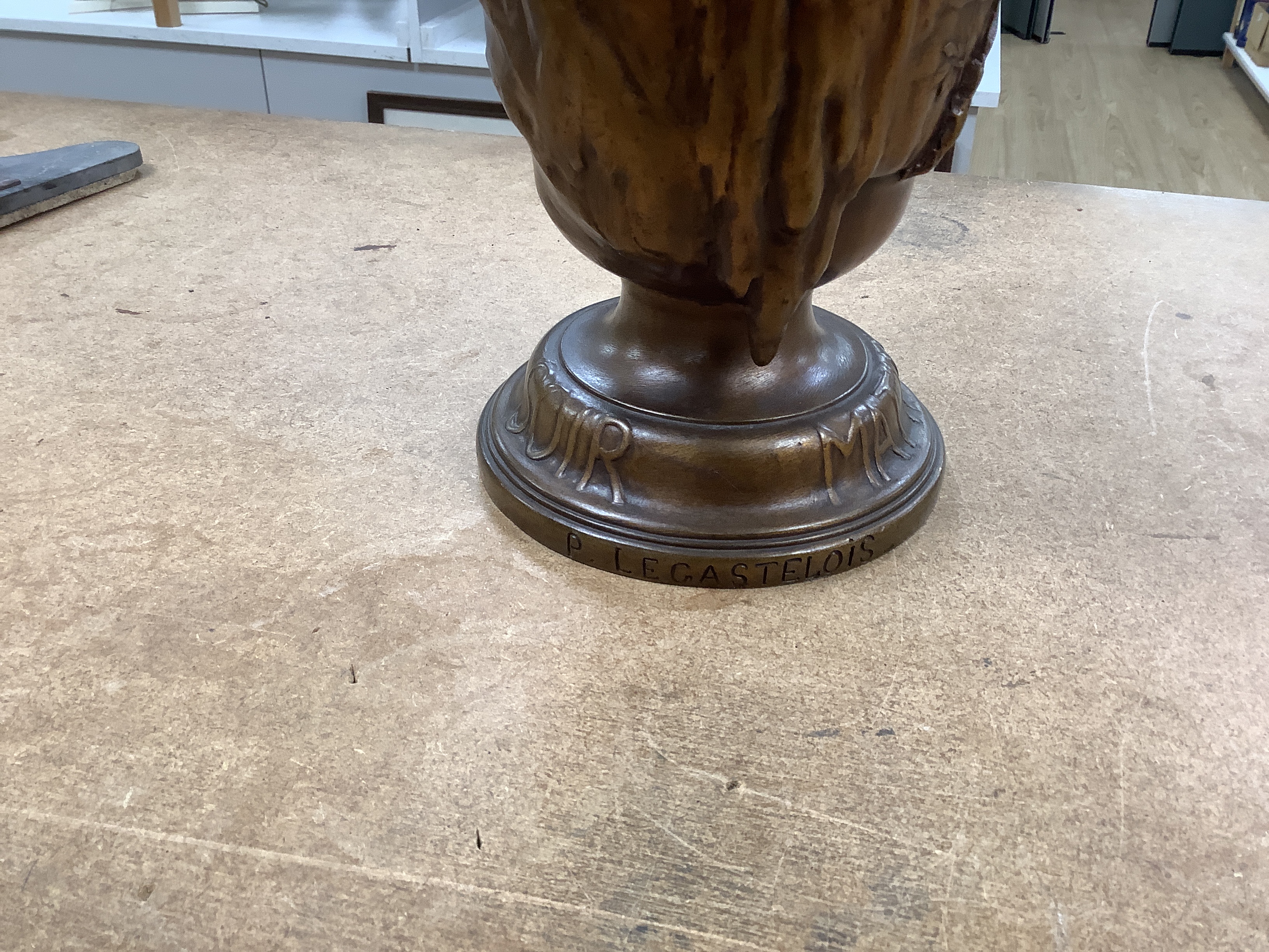 A Jules Prosper Legastelois bronze figural Art Nouveau vase and a slate pediment decorated with two putti, the vase signed, 34cm high